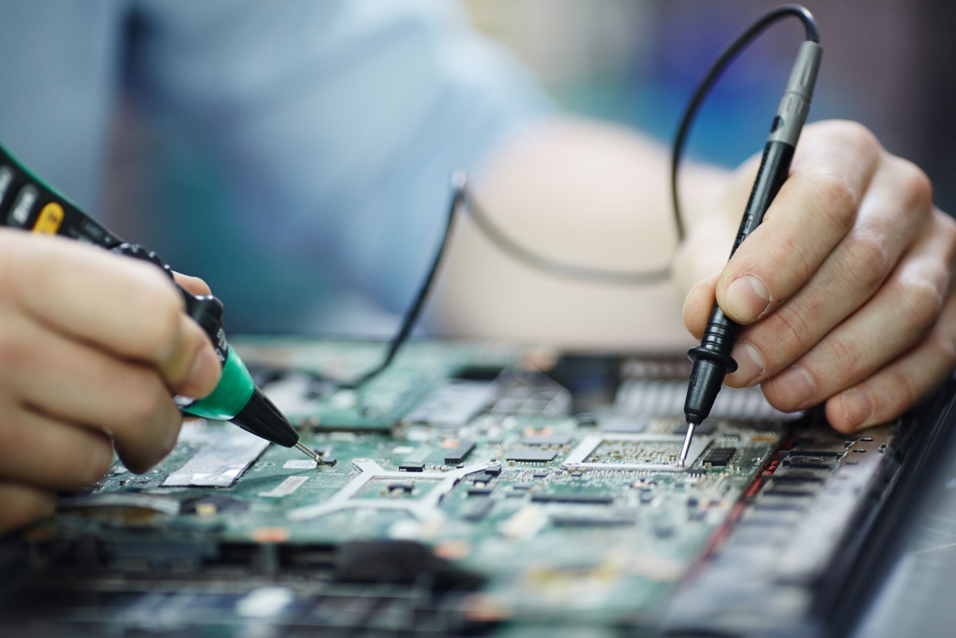 checking-current-laptop-circuit-board-1